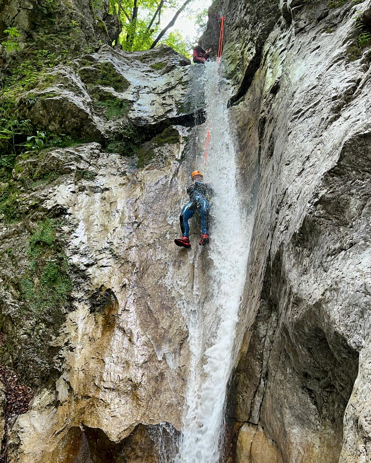 Sliding down a waterfall in Sušec canyon. Would yo…
